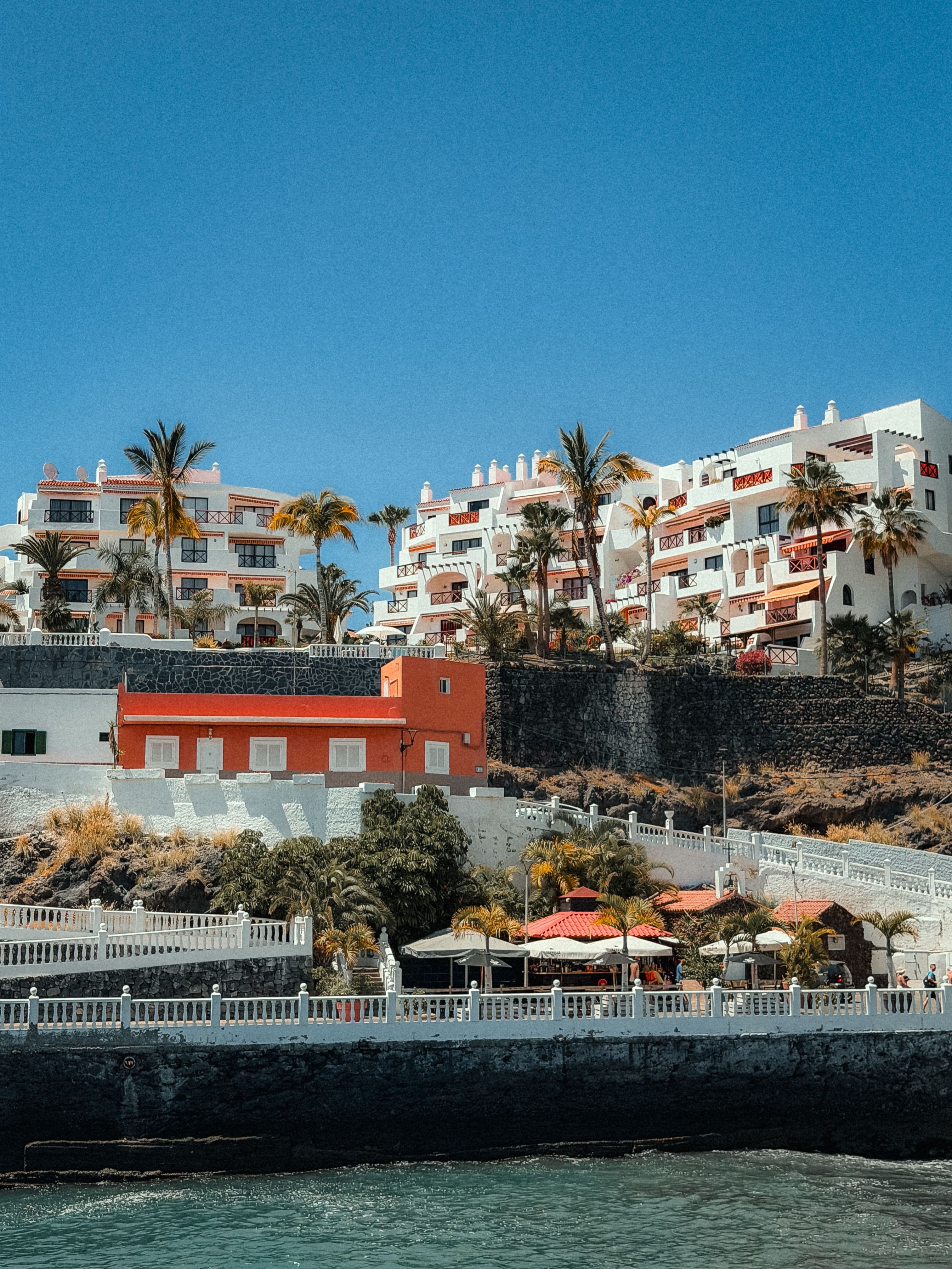 Scenic view of Spanish architecture along the coast of Puerto de Santiago, Canary Islands.